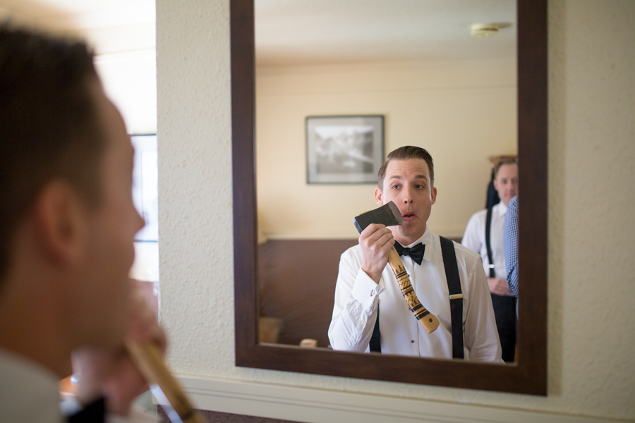 Deer Lodge wedding with groom shaving