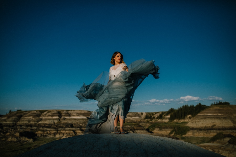 day after session in Drumheller alberta, bride is in a smokey blue wedding dress