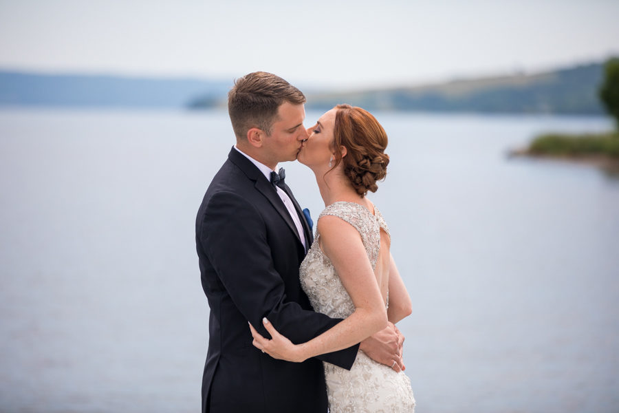 first look before the wedding at The Inverary Resort in Cape Breton, on a dock