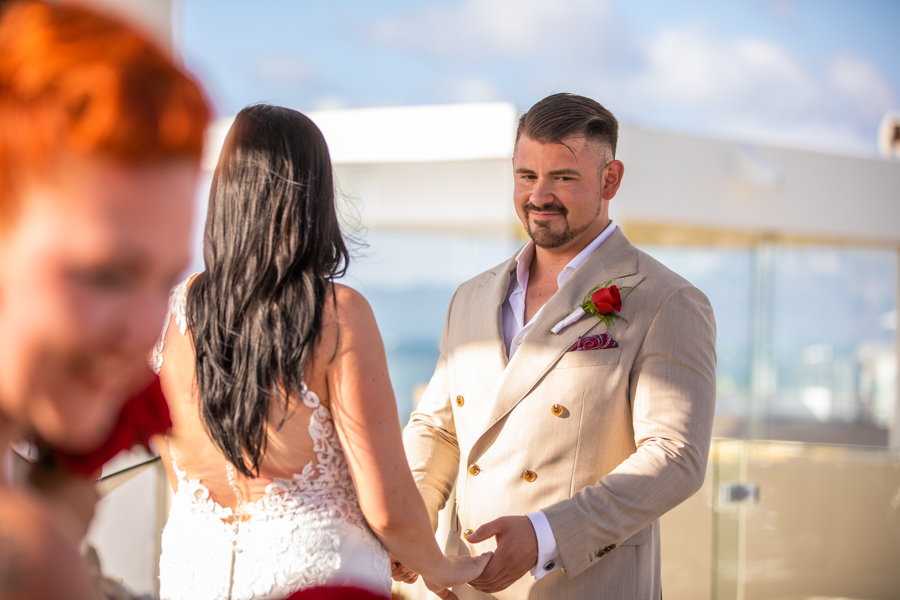 IBEROSTAR PLAYA MITA wedding - destination wedding photographer Cole Hofstra groom at the alter