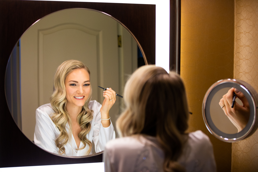 bride getting ready at Sheraton Suites Calgary Eau Claire