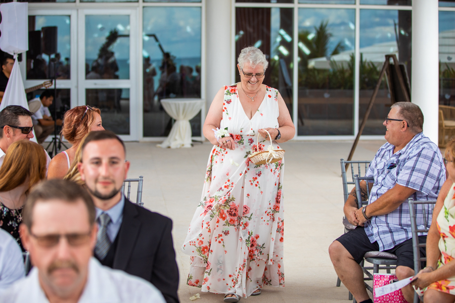 Grandmother as a flower girl in a wedding