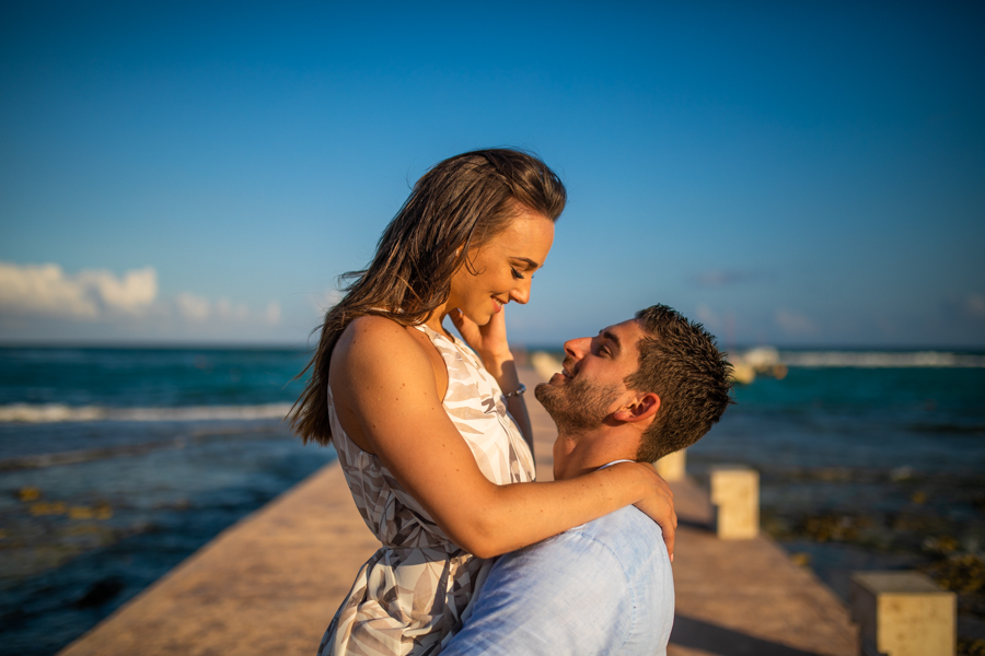 couple standing on a dock in Cancun