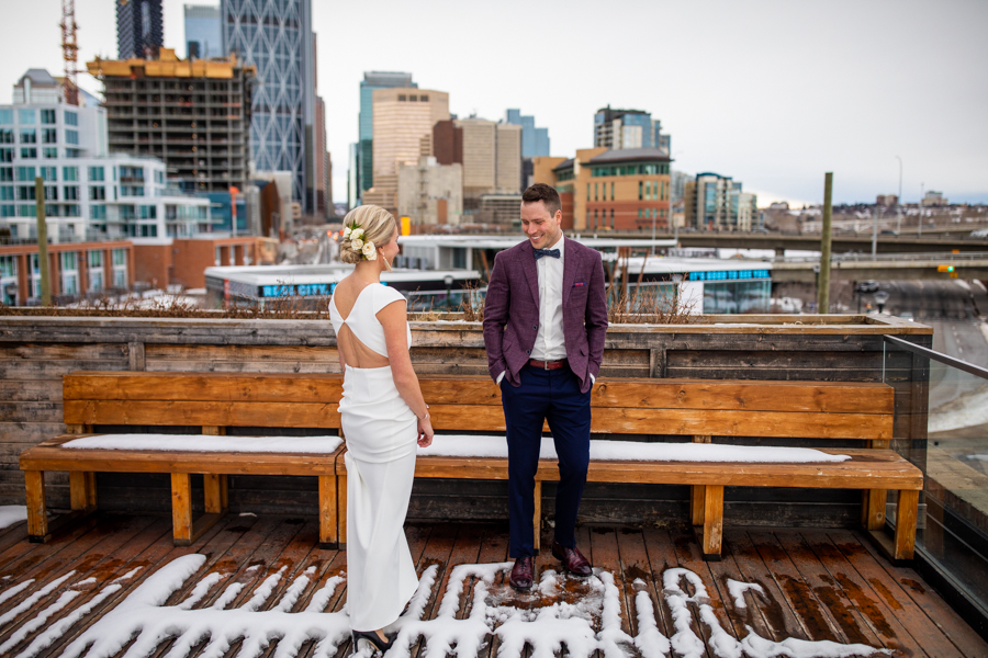 Couple doing first look on top of Charbar Calgary
