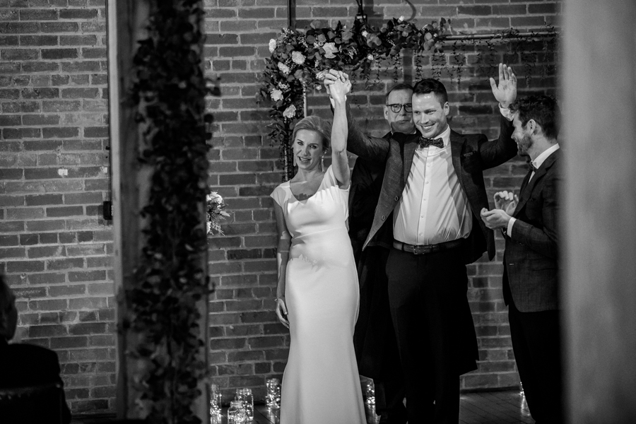 Bride and groom celebrate in Charbar Calgary wedding