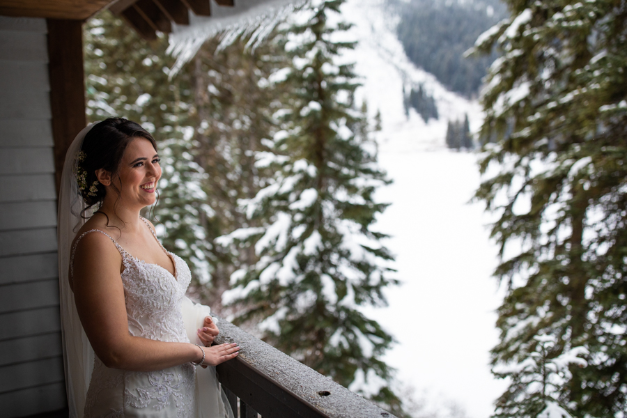 bride in her room at emerald lake lodge wedding