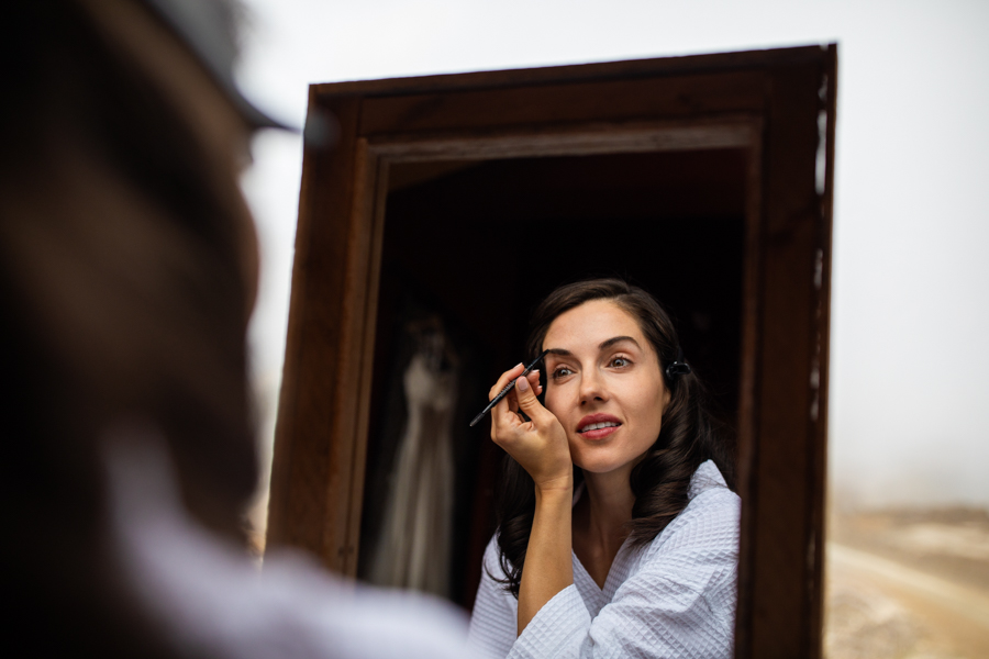 Bride getting ready in Eagles Eye Golden BC