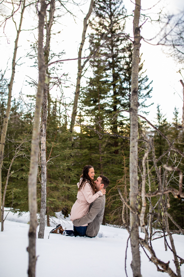 couple playing in the snow