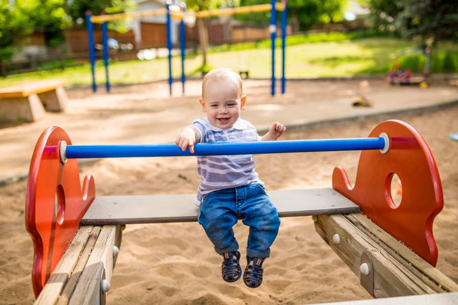 Calgary park family photos on a swing