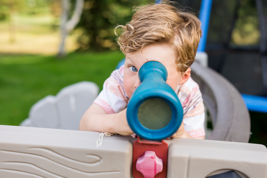 spyglass looking during family photography