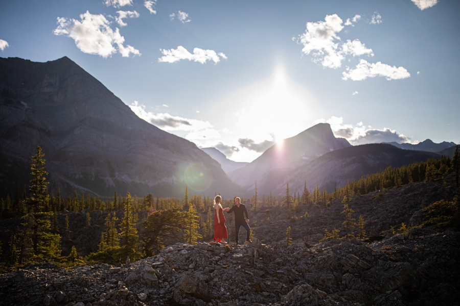 mountain engagement Kananaskis in a red dress