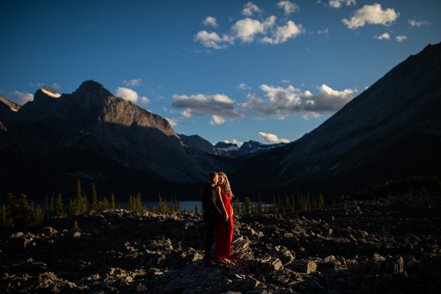 girl in a red dress in the mountains
