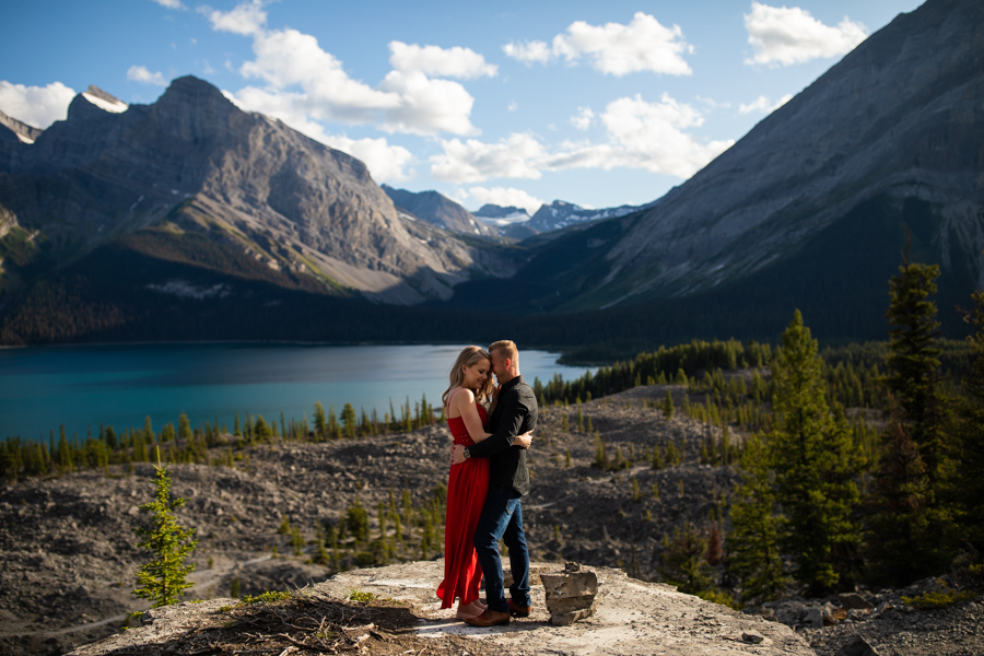 mountain engagement kananaskis in Kananaskis with couple on a rock