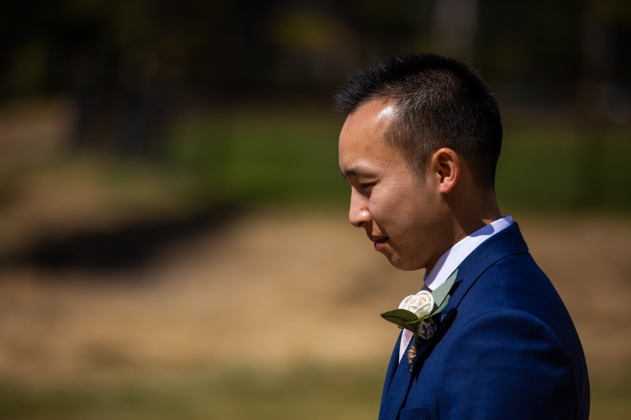 groom waiting for hi elopement ceremony to begin