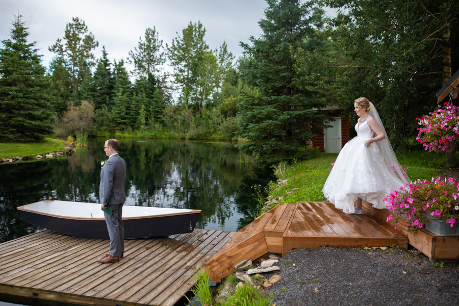 first look on pine and pond wedding dock