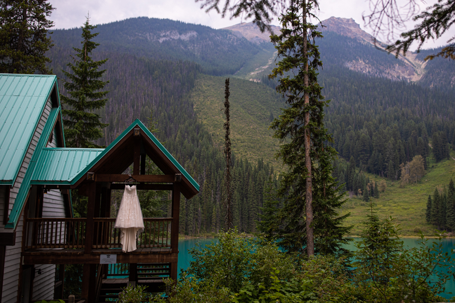 wedding dress hanging off a cabin at emerald lake