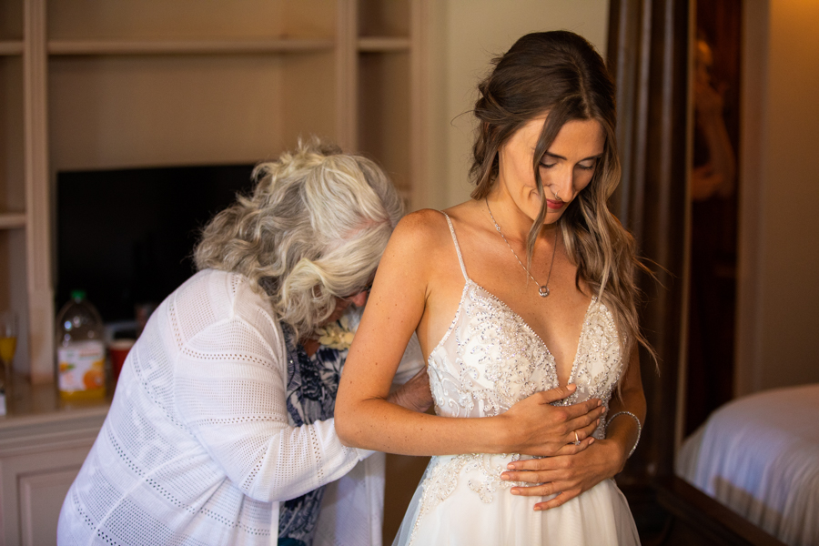 bride getting ready with mom