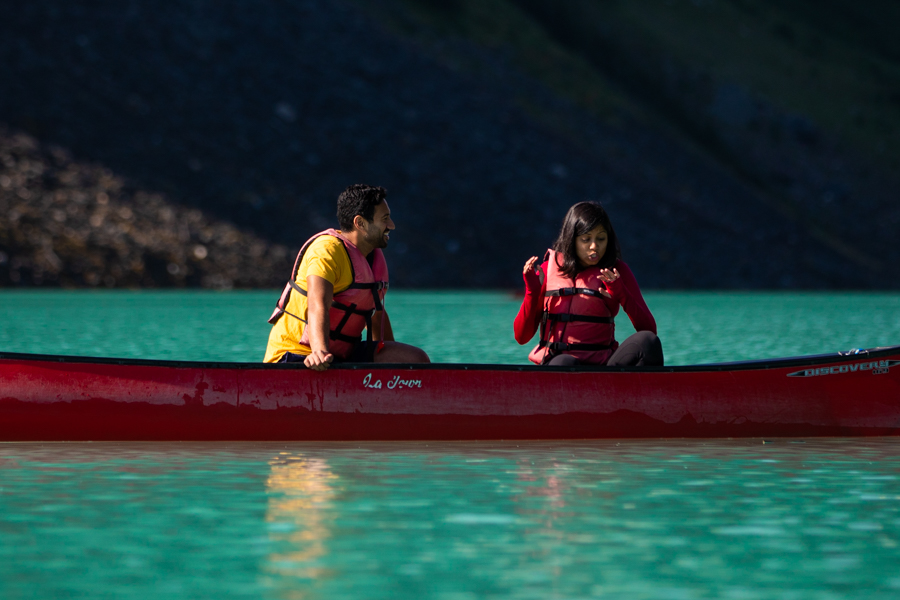 looking at wedding ring in Canoe on lake louise