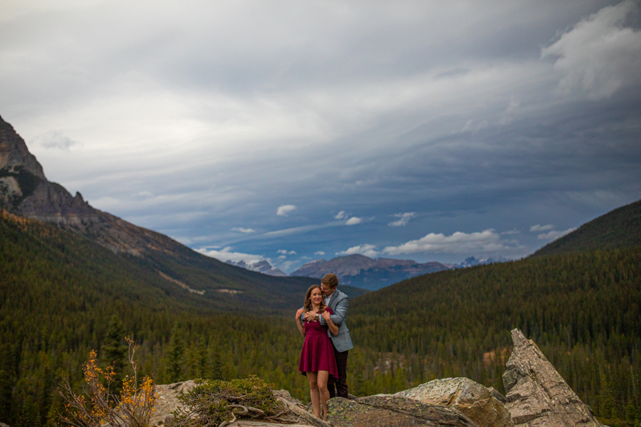 Lake Moraine Engagement Photos with blue watter
