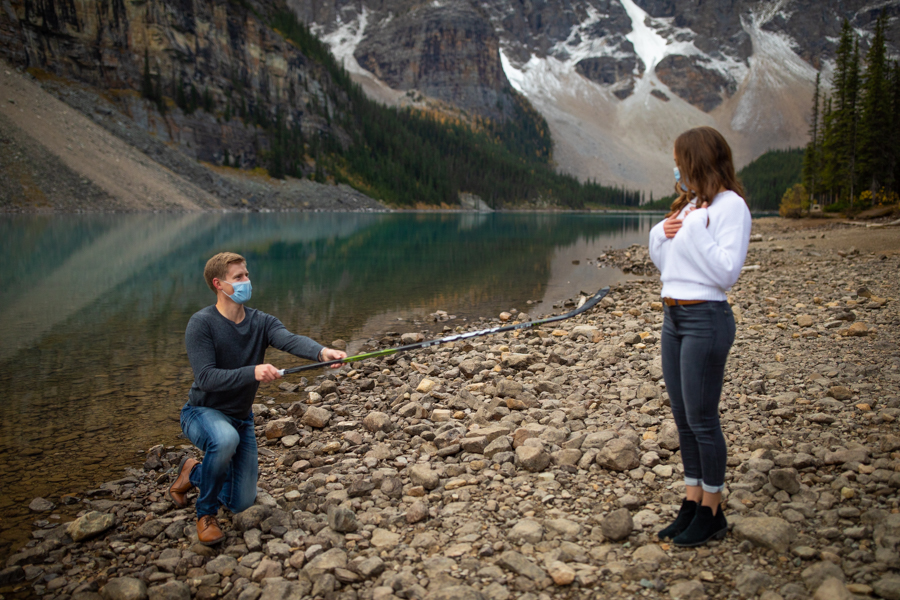 propose with a hockey stick during covid