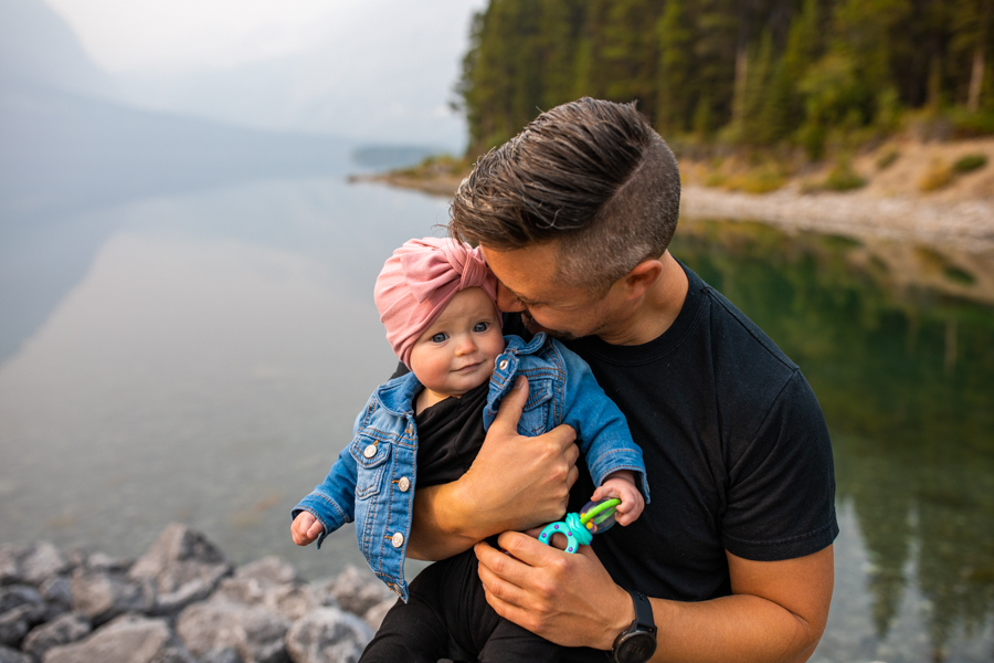 dad kissing daughter for a mountain Family adventure session