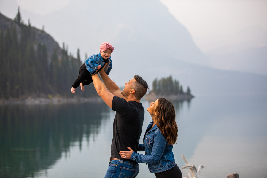 father plays airplane with daughter for family photos, Mountain Family adventure session