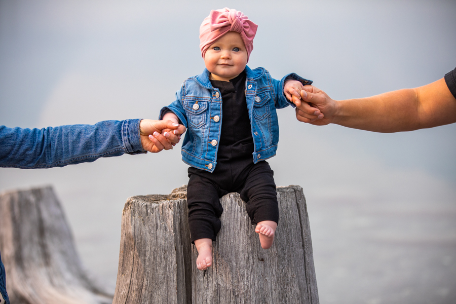 holding baby's hands