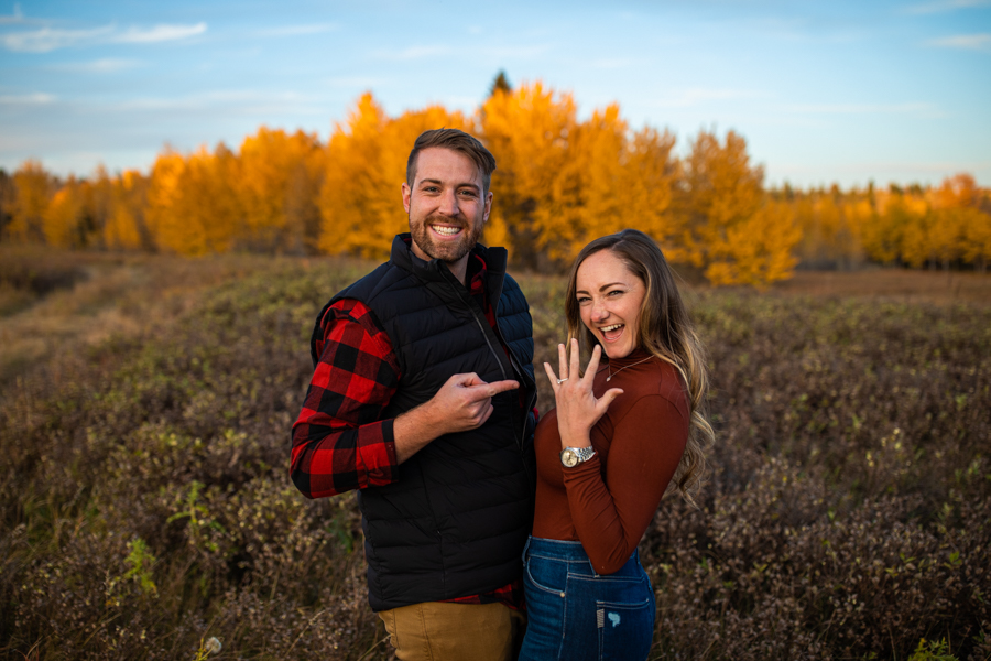 showing off the ring after saying yes to the Perfect Proposal Ideas Calgary