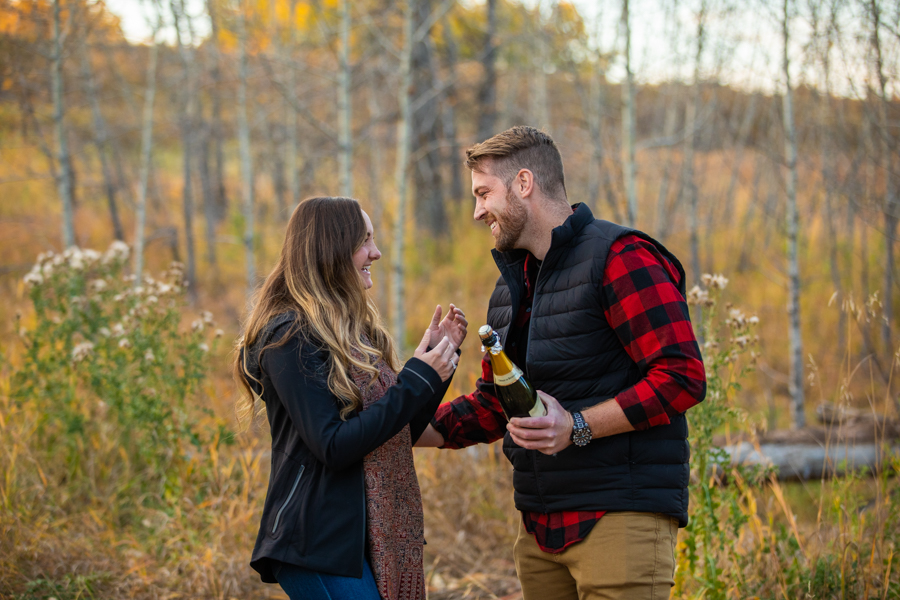 popping champagne after she says yes