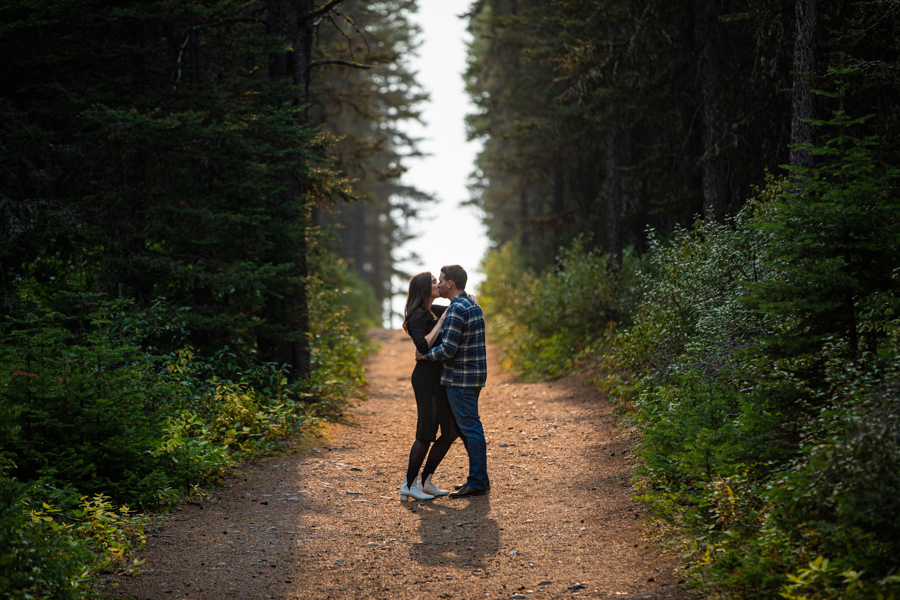 couple one the mountains kissing